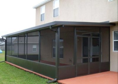 black patio cover with black screens